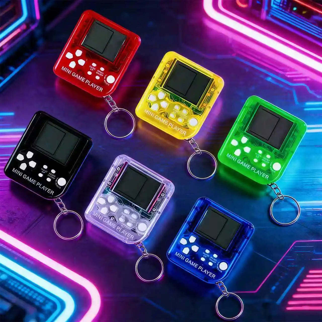 Colorful Fidgix Nano™ players with keychains on a neon-lit background